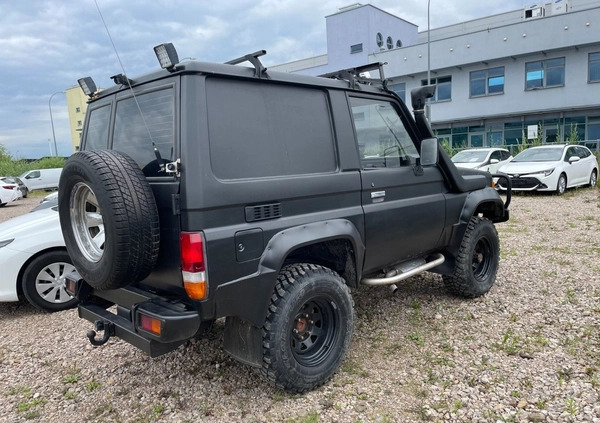 Toyota Land Cruiser cena 69900 przebieg: 363433, rok produkcji 1987 z Olsztyn małe 211